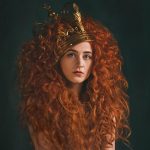 Book cover of My Confessional by Janet Devlin which sees her naked with her long auburn curly hair flowing over her shoulders with a crown on her head.